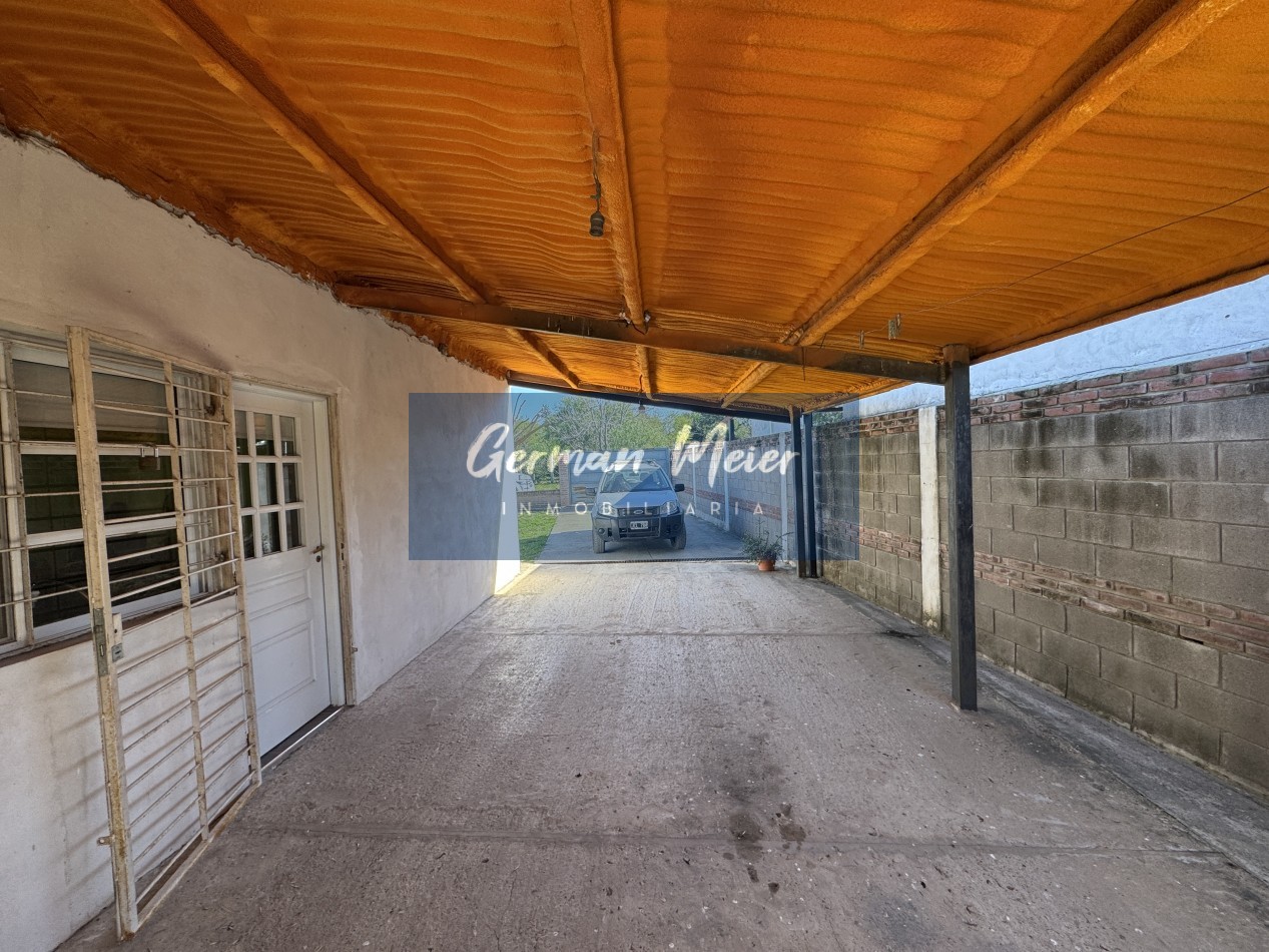 SE VENDE CASA CON AMPLIO TERRENO