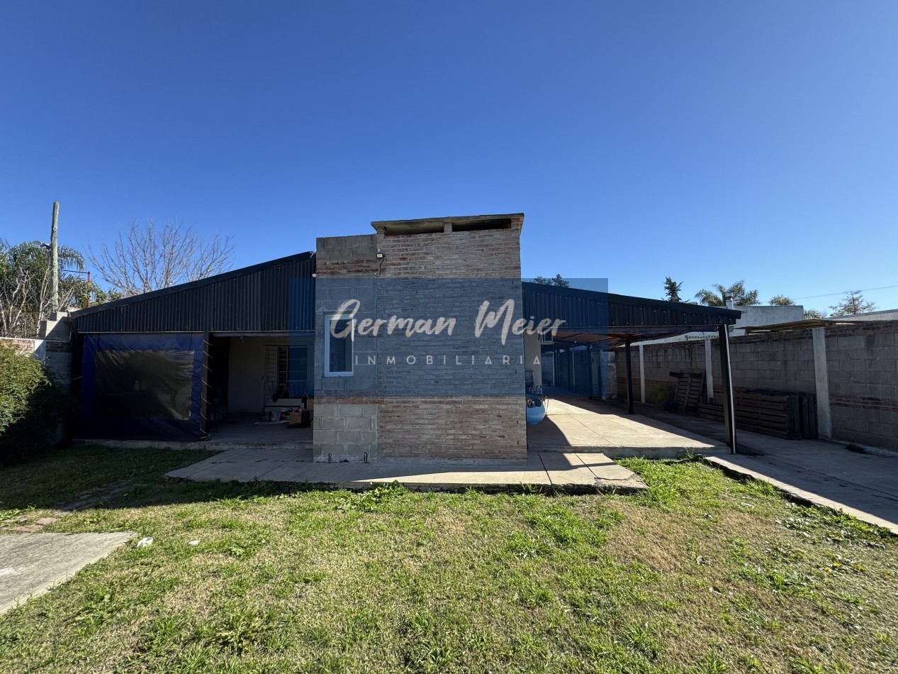 SE VENDE CASA CON AMPLIO TERRENO