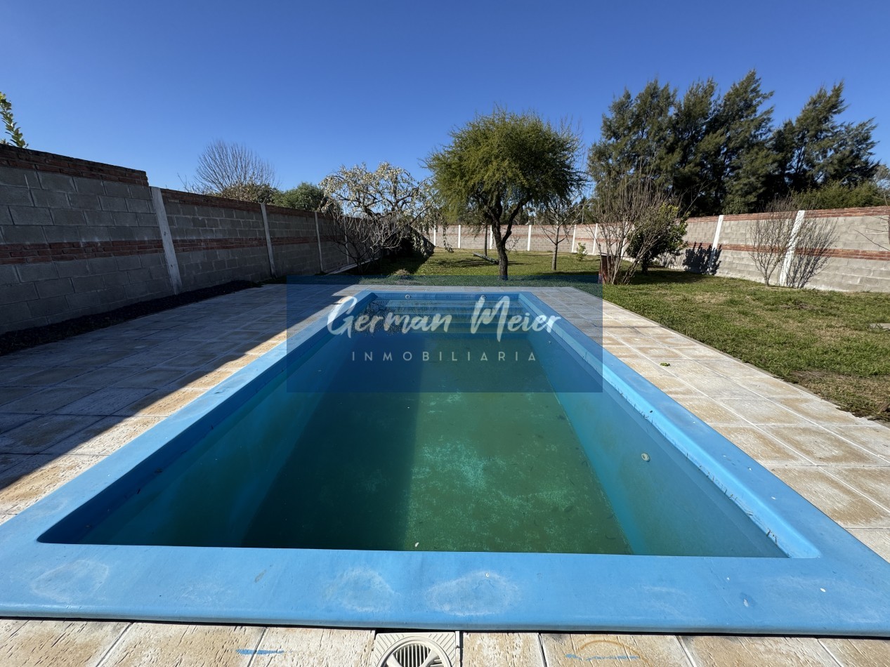 SE VENDE CASA CON AMPLIO TERRENO