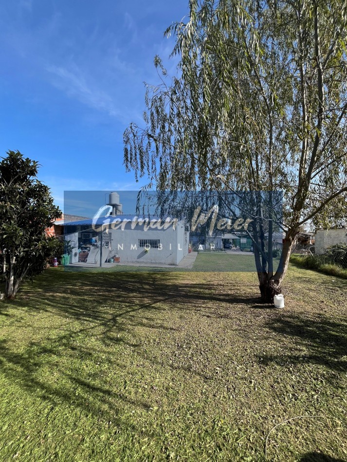 CASA EN VENTA CON AMPLIO PATIO VERDE  En Colonia Avellaneda.